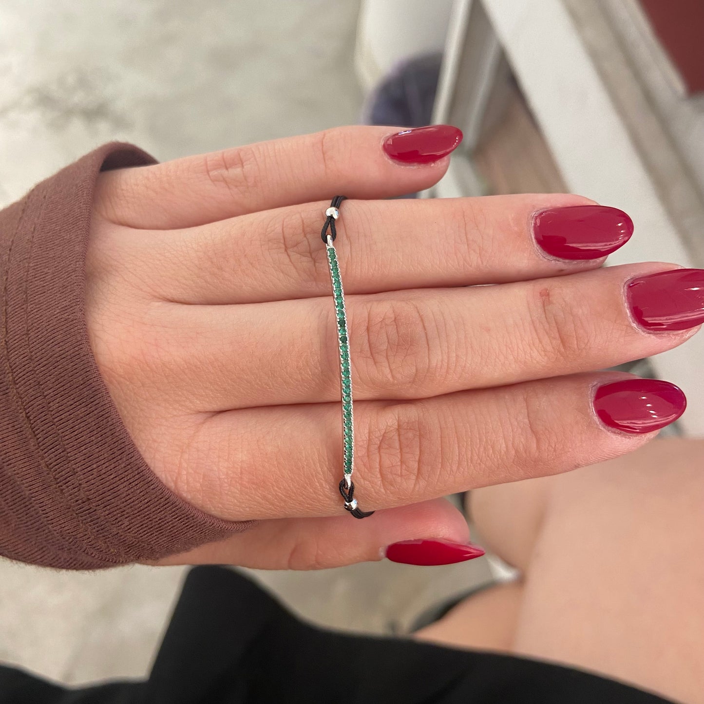 Bracciale filo nero barretta verde argentata
