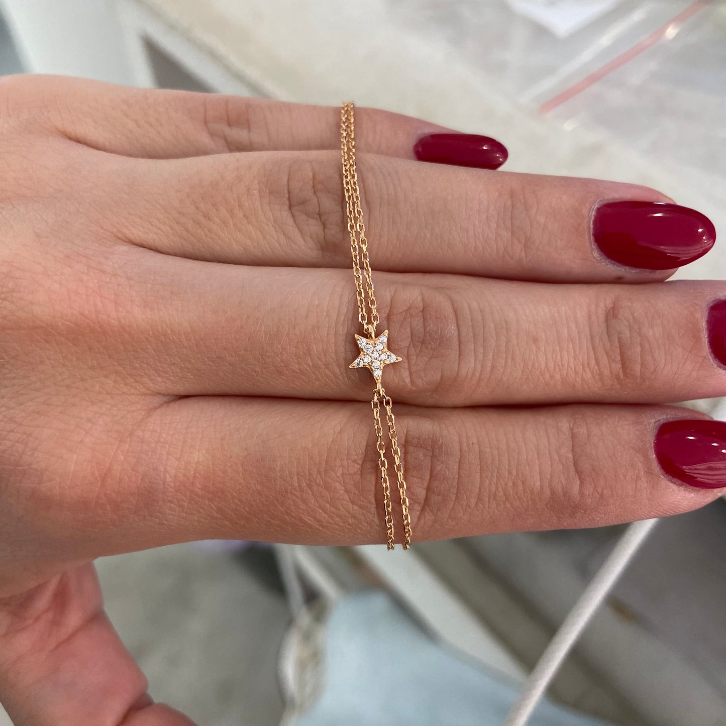bracciale finitura rose gold, Zirconi Bianchi