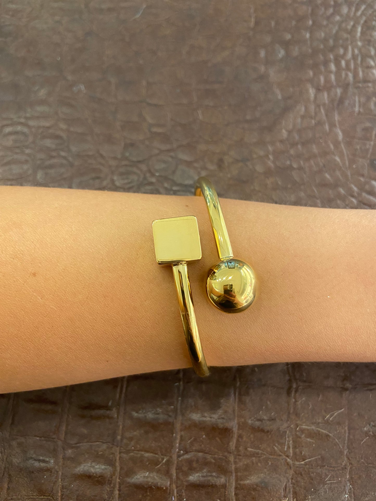 Bracciale Rigido Dorato sfera e cubo