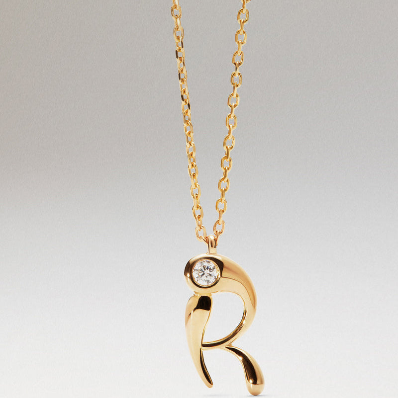 Collana con pendente iniziale R