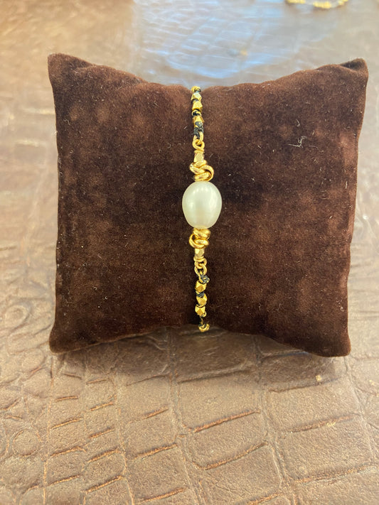 Bracciale cordino perla centrale