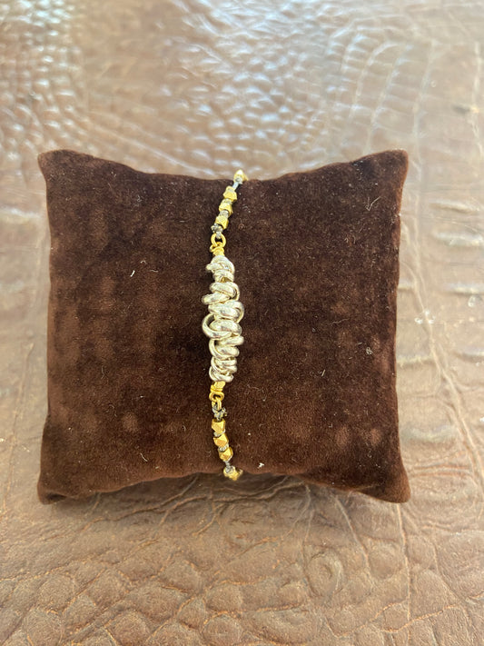 Bracciale cordino anelli annodati