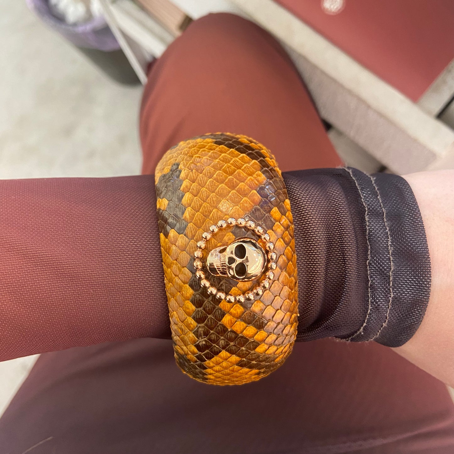Bracciale Rigido Pitonato Arancio Teschio