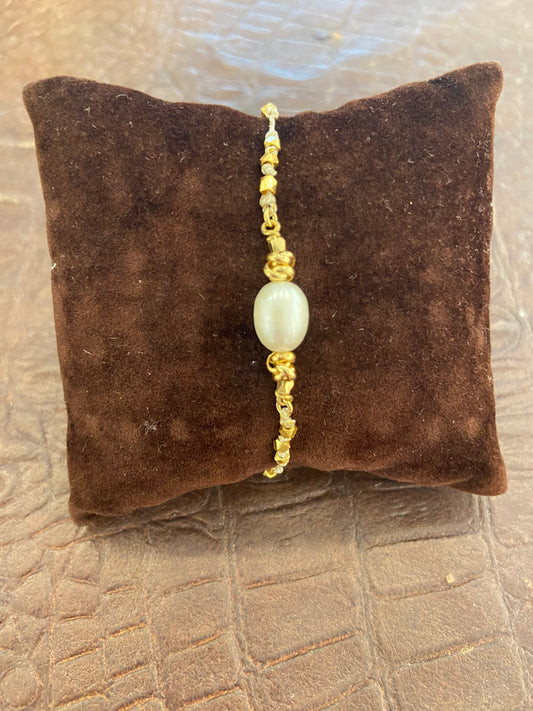 Bracciale cordino perla centrale