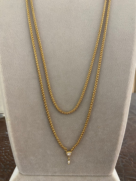 Collana lunga dorata con zircone