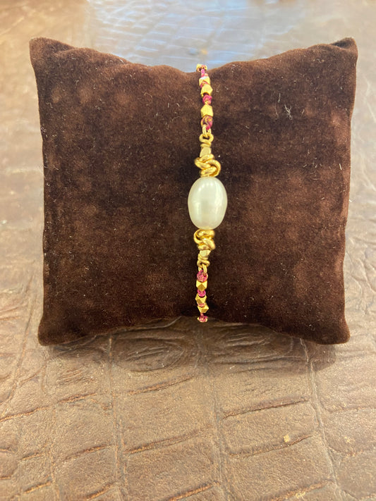 Bracciale cordino perla centrale