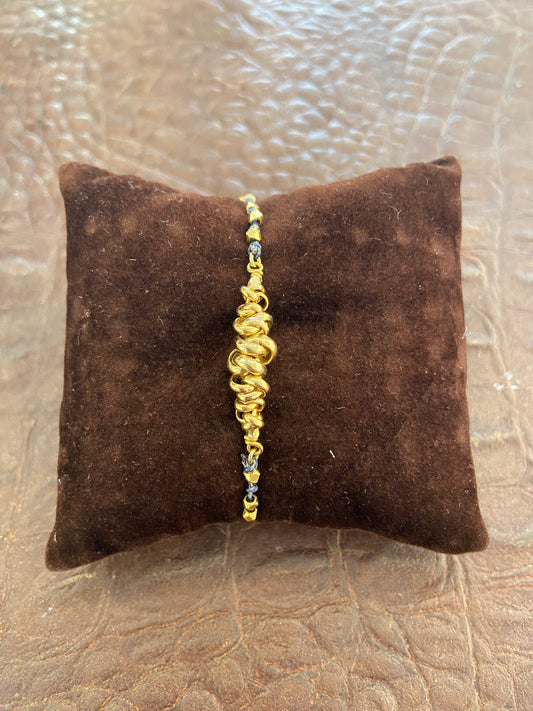 Bracciale cordino anelli annodati