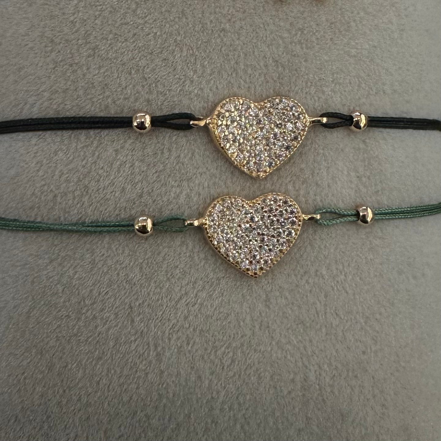 BRACCIALE CUORE ROSE GOLD CON PAVè DI ZIRCONI E LACCIO NERO