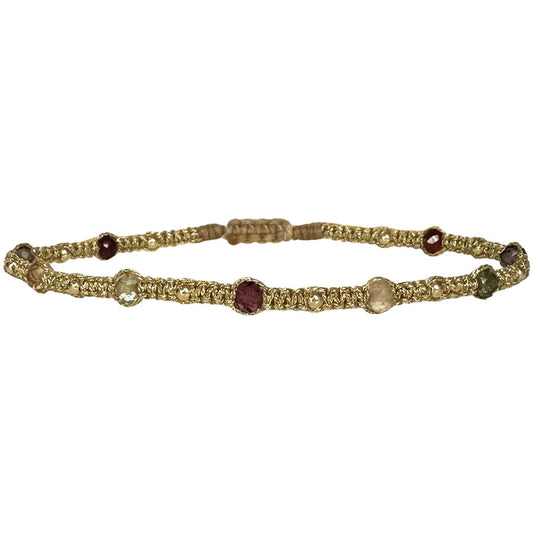 Bracciale tessuto dorato e perline